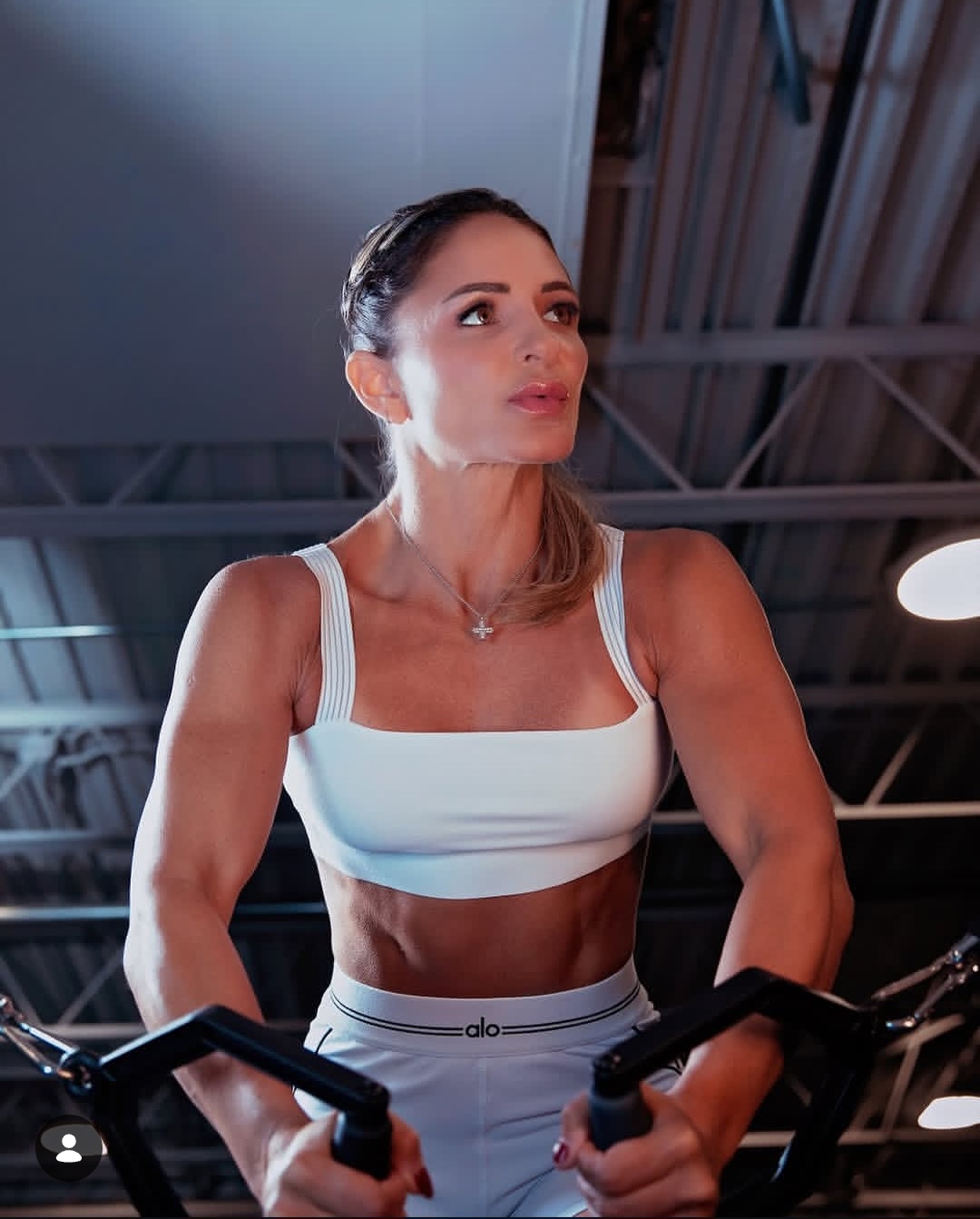 Juliana training on a strength machine